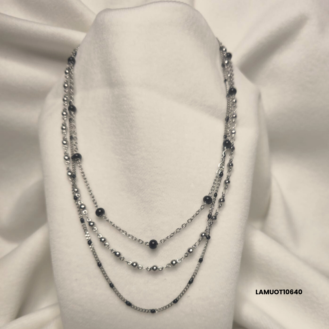 Multi-strand stainless steel necklace with black enamel spheres