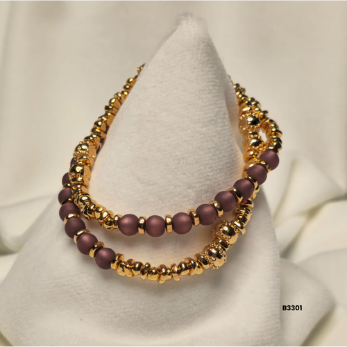 Double bracelet with cat's eye stone and rose gold beads
