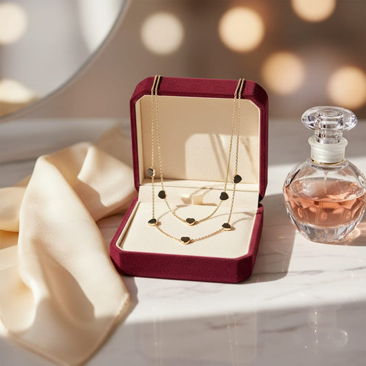 Collana doppia in acciaio con piccoli cuori