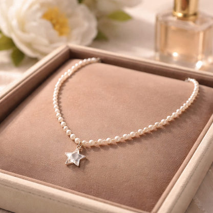 Collar de acero inoxidable con perlas blancas y colgante de estrella de concha natural