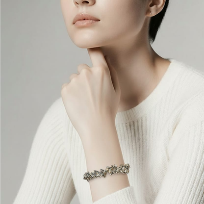 BRACCIALE MILLE CUORICINI IN ACCIAIO COLOR ARGENTO CON SONAGLIO