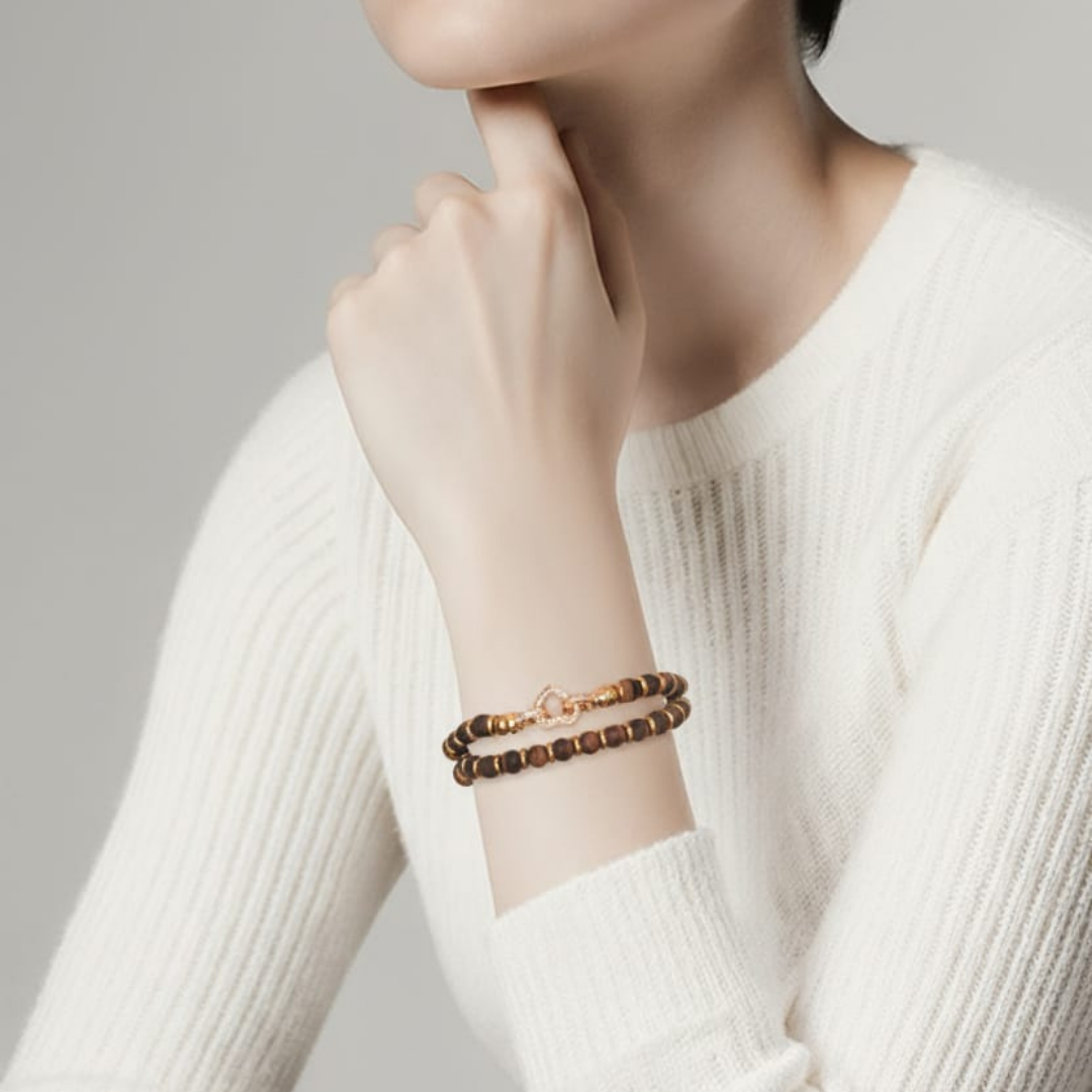 Bracciale doppio con perline di pietra e chiusura a cuore in oro rosa