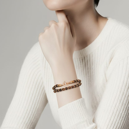 Bracciale doppio con perline di pietra e chiusura a cuore in oro rosa