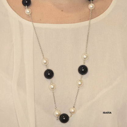 Necklace with 12 mm white Swarovski pearls and 18 mm natural black onyx stone with 925 sterling silver components
