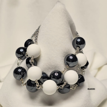 Bracelet with 12 mm Shell stone + 12 mm hematite and 8×12 mm ovaline with 925 silver pieces