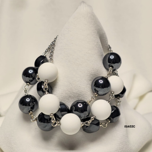 Bracelet with 12 mm Shell stone + 12 mm hematite and 8×12 mm ovaline with 925 silver pieces