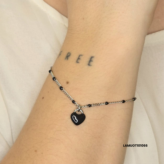 Stainless steel bracelet with black enamelled convex heart charm