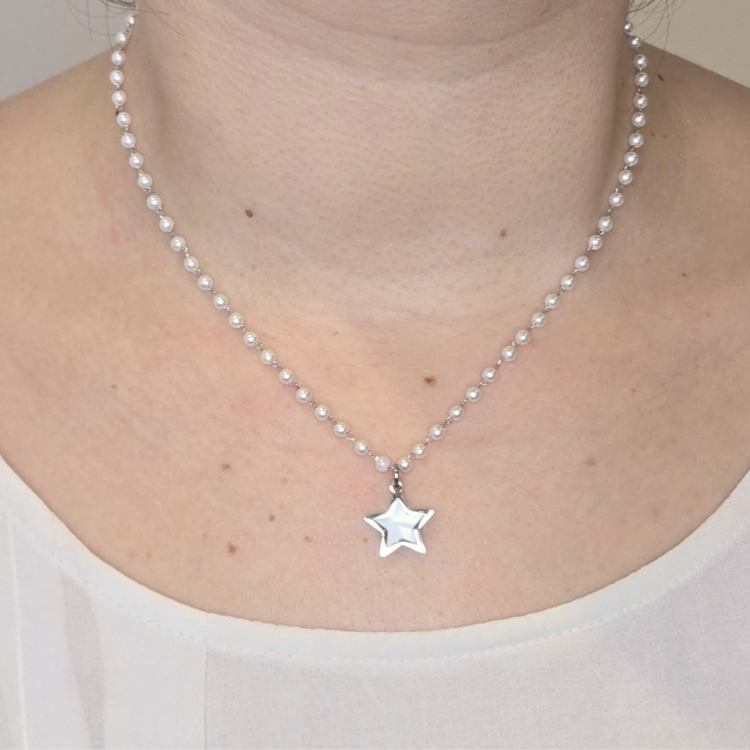 Stainless steel necklace with white pearls and natural shell star pendant