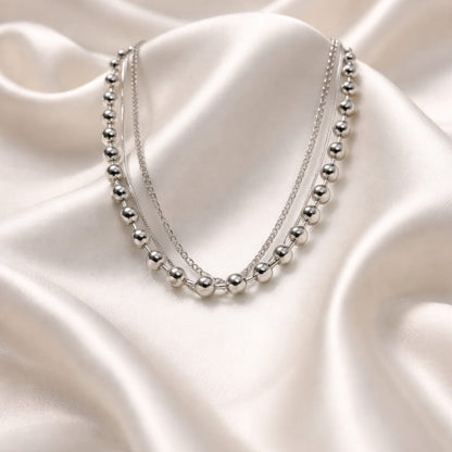 Collar triple de acero inoxidable