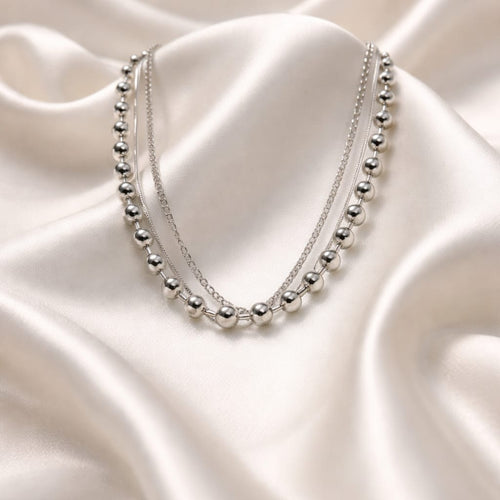 Collar triple de acero inoxidable